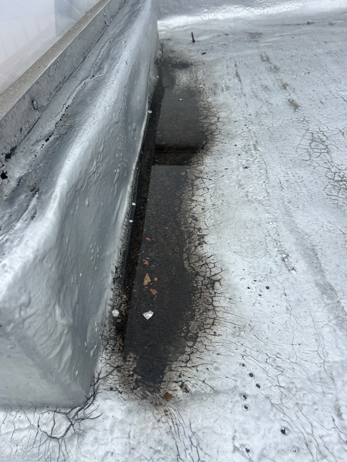 What Is a Roof Cricket, and Why Does My Flat Roof Need One?